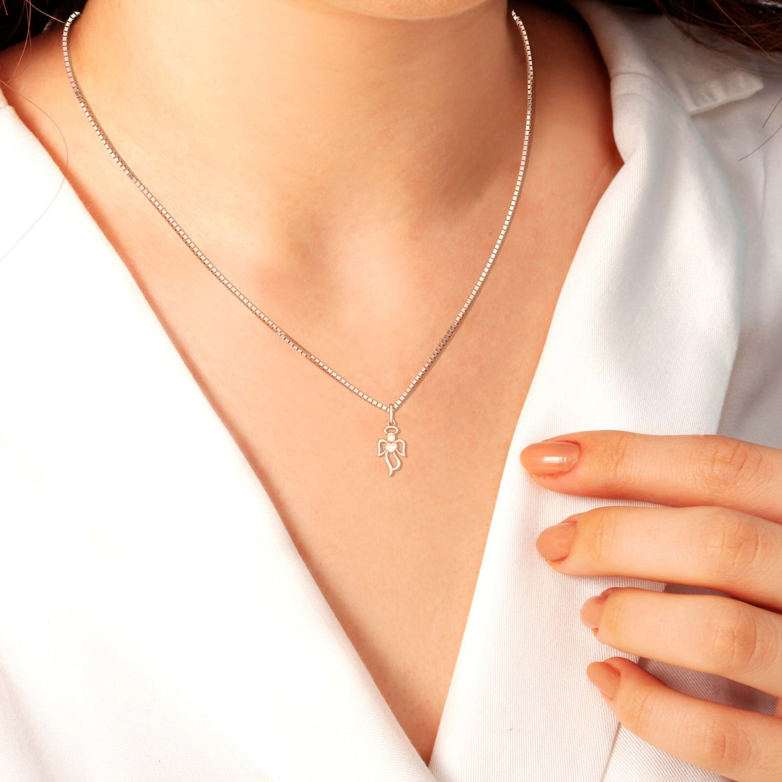 10kt gold angel pendant on a box chain is a wonderful choice for good luck! The angel symbolizes protection and guidance, and when combined with a box chain, it offers both a modern look and durability